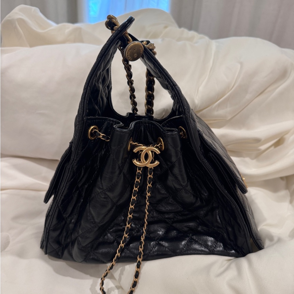CHANEL Quilted Black and Gold Chain Shoulder Bag